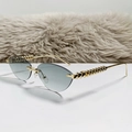 Cat eye rimless sunglasses with gold pyramid studded metal temples and grey lenses - Gradient Green
