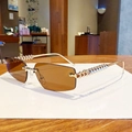 Retro rimless sunglasses with gradient brown lenses and golden studded metal arms - Transparent Tea