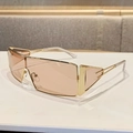Occhiali da sole shield con montatura dorata e lenti rosa chiaro per uno stile outdoor - Tè Chiaro