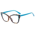 Occhiali cat eye alla moda con montatura tartarugata vintage e dettagli blu su fondo bianco - Montatura Tartarugata Blu