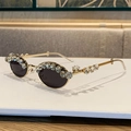 Chic golden oval sunglasses with luxury crystal embellishments and dark tinted lenses - Gold Frame Full Grey