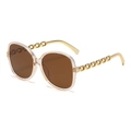 Lunettes de soleil oversize tendance avec monture transparente et branches en chaîne - Monture Champagne / Verres Thé