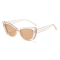 Fashionable cat eye sunglasses in transparent champagne with pearl side decorations - Champagne Frame / Tea Lens