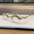 Fashionable golden oval sunglasses with sparkling rhinestones on slim metal frame - Gold Frame Clear Lens