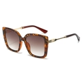 Lunettes de soleil carrées en écailles de tortue avec branches dorées et verres dégradés - Monture Léopard / Verres Thé