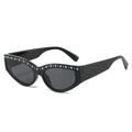 Gafas de sol cat-eye en negro brillante con incrustaciones de perlas y lentes grises - Montura Negra Lentes Gris Negro