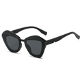 Schicke schwarze Cat-Eye-Sonnenbrille mit strukturierter Holzmaserung am Oberrahmen - Schwarzer Rahmen Schwarz Graue Gläser