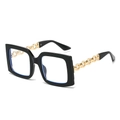 Black oversized square sunglasses featuring stylish golden chain-link metal temples - Black Frame