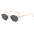 Classic cat eye sunglasses with cream beige frames and dark grey lenses in 45-degree view - Beige Frame Black Gray Lens