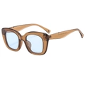 Retro cat-eye sunglasses with amber brown frames and light blue lenses in a stylish 45-degree view - Tea Frame Blue Lens