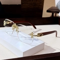 Frameless square sunglasses featuring brown wood temples and gold cross metal accents - Anti-blue Light White Plain