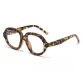 Retro oversized round glasses featuring classic brown tortoiseshell frames and clear lenses - Tortoiseshell Frame