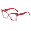 Pink and red cat eye sunglasses with leopard print accents and butterfly frame - Red Demi Frame