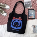 Retro black canvas tote bag with artistic girl print and bold typography for daily use - Black Food Factory Girl Vest Bag