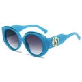 Gafas de sol redondas azul real estilo cat-eye con lentes degradadas y detalle dorado - Montura Azul Lentes Grises