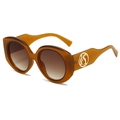 Gafas de sol redondas ámbar retro con montura ancha y logo dorado en las patillas - Montura Té Lente Té