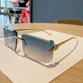 Frameless square sunglasses with light blue gradient lenses and gold leopard head detail - Blue Tea