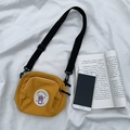 Bolso bandolera de lona amarillo brillante con parche redondo y correa negra ajustable - Amarillo