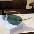 Fashionable rimless square sunglasses with dark green lenses and golden bamboo temples - Green