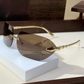 Fashionable rimless square sunglasses with gold bamboo-shaped arms and brown gradient lenses - Transparent Tea