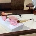 Frameless oval sunglasses with pink lenses and golden metal temples for a retro style - Transparent Pink