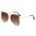 Lunettes de soleil papillon tendance avec strass et verres dégradés marron - Monture Dorée Verres Ambrés
