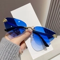 Occhiali da sole cat-eye senza montatura con lenti blu sfumate e leopardo dorato - Doppio Blu