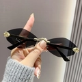 Frameless geometric sunglasses with grey lenses and gold leopard head temple accents - Solid Grey