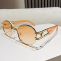 Occhiali da sole ovali rétro con montatura dorata e lenti arancioni per uno stile trendy - Montatura Oro Asta Arancione Trasparente Lente Arancione Sfumata