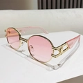 Fashionable oval sunglasses with pink lenses and gold-tone镂空 metal temples - Golden Frame Transparent Pink Temple Gradient Pink Lens