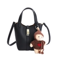 Black pebbled leather bucket bag with gold clasp and cute plush bear charm accessory - With Pendant / Black