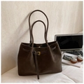 Detail of dark brown matte tote bag with thin straps and metallic hardware details - Coffee without Pendant