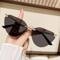 Frameless cat-eye sunglasses with grey gradient lenses and golden wavy metal temples - Solid Grey