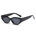 Occhiali da sole cat eye vintage neri con eleganti borchie in argento laterali - Montatura Nera Lenti Grigio Nero