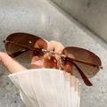 Fashionable rimless oval sunglasses with brown gradient lenses and golden metal temples - Gradient Tea