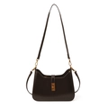 Minimalist dark brown underarm bag with gold twist lock and smooth matte finish - Brown