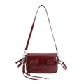 Deep red square shoulder bag with glossy leather finish and dual buckles on white background - With Charm / Burgundy