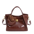 Vintage dark brown glossy leather tote bag with dual handles and gold hardware details - Brown
