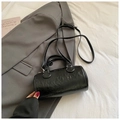Chic black cylinder shoulder bag in oily leather texture with top handles and strap - Black without Pendant