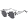 Fashionable translucent grey sunglasses with black lenses and rivet detail outdoors - Grey Frame Grey Lens