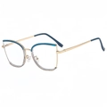 Chic cat-eye glasses frame with gold metal finish and dark blue accents in a 45-degree view - Blue and Gray Frame