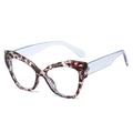 Montatura cat eye con trama floreale rossa e stanghette azzurre traslucide - Montatura Leopardata Grigia
