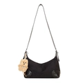 Black canvas dumpling bag with leather patches and a brown plush bear pendant - Black With Pendant