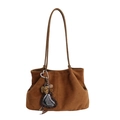 Brown suede tote bag with leopard print pompom and heart mirror charm on white background - Suede Surface With Pendant / Brown