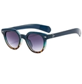 Occhiali da sole ovali blu scuro e tartarugati con eleganti decorazioni a stella - Montatura Tartarugata Blu Lenti Sfumate Grigie
