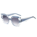 Occhiali da sole cat-eye blu traslucido con bordi geometrici poligonali unici e moderni - Montatura Grigia Lenti Grigie Sfumate