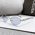 Occhiali da sole ovali in metallo argento con lenti blu e strass a cuore sulle aste - Montatura Dorata Lenti Blu