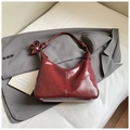 Chic burgundy patent leather shoulder bag with knot strap detail on a grey blazer - Wine Red (Without Pendant)