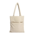 Minimalist beige quilted puffer tote bag with padded shoulder straps on white background - Apricot