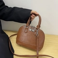Brown vintage shell-shaped handbag with textured leather finish and adjustable strap - Brown (Without Pendant)